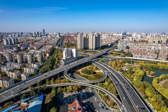 Aerial shot of the traffic on infinity highways,the modern buildings, skyscrapers in Nanchang China