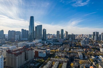 Aerial view of cityscape Tianjin surrounded by buildings