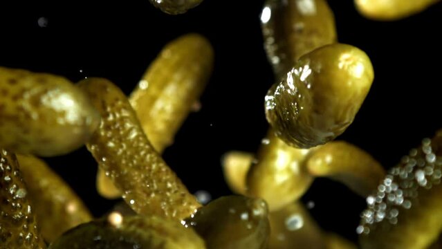 Super slow motion Pickled cucumbers. High quality FullHD footage