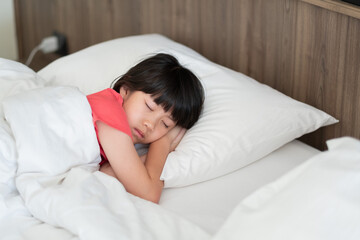 asian kid sleep on bed, sick child - 781192527
