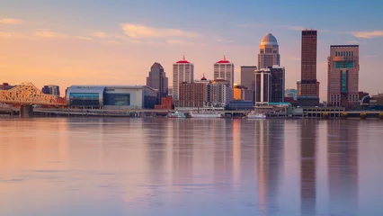Fotobehang Louisville, Kentucky, USA. Cityscape image of Louisville, Kentucky, USA downtown skyline with reflection of the city the Ohio River at spring sunrise. © rudi1976