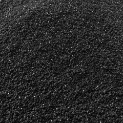 Fototapeta premium Black lava salt. Fine texture of the product. Healthy eating.