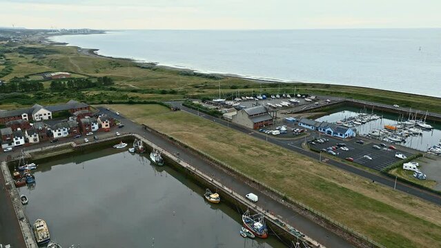Drone footage flyover Maryport fishing village in Allerdale a borough of Cumbria, England