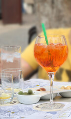 Refreshing summer aperitif on outdoor table
