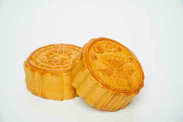 Moon cakes on white background, Chinese mid-autumn festival food.high-quality five kernels, milk flavored grapes, chestnuts, three flavors.