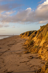 Sand dunes lininig the Beach, at Formby, with evening light