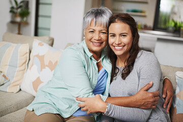 Mother, smiles and hugs woman in home portrait for love, family or sharing moment together on sofa. People, happy and embrace in living room couch for bonding, connection and relationship growth - obrazy, fototapety, plakaty
