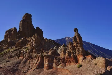 Foto op Canvas Los Roques de Garcia rocky formation under a blue sky © Wirestock