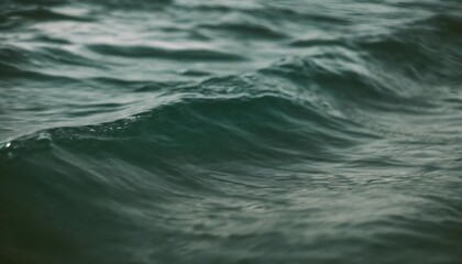 image of the water surface of the sea in green tones