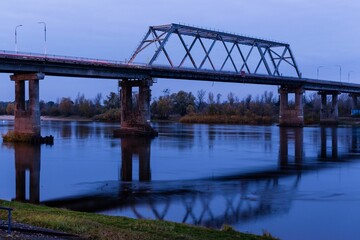 Bridge over the river in Mozyr, Belarus, in the evening
