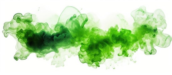 Green ink swirls on white surface