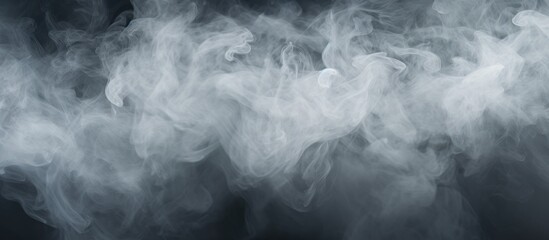Smoke billowing from the bottom against black backdrop