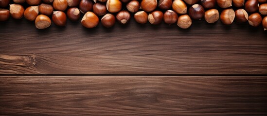 Obraz premium Hazel nuts close up on wooden surface