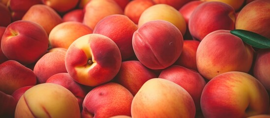 Peaches stacked in a heap