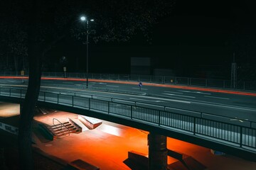View of a bridge above the skatepark in Schweinfurt at night