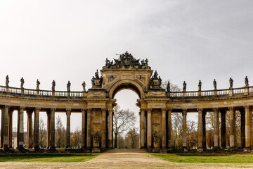 The elaborate arch, surrounded by detailed statues and columns.