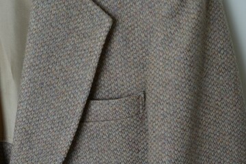 Closeup shot of a tweed jacket.