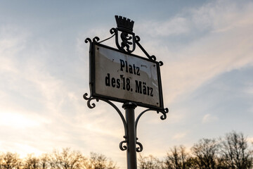 Street sign of the famous Platz des 18. Marz (March 18th Square) near the Brandenburg Gate in Berlin. - obrazy, fototapety, plakaty