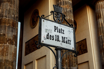 Street sign of the famous Platz des 18. Marz (March 18th Square) near the Brandenburg Gate in Berlin.