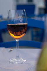 glass of red wine on the table