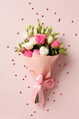 Bouquet of flowers on pink background. Happy Mother's Day, International womens day, birthday concept.