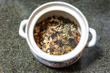 Chinese medicinal materials. Chinese people like to use Chinese medicine to treat diseases. Chinese medicine is combined with Western medicine. Special ceramic pots are used to cook medicine.