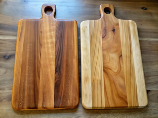 2 Wooden cutting boards on the table