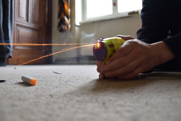 toy gun shooting firework