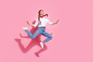 Full length photo of pretty dreamy lady dressed cowboy outfit jumping high emtpy space isolated pink color background
