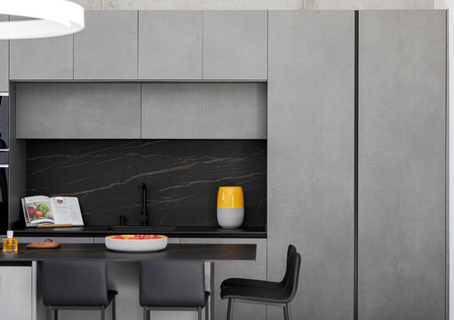 Modern kitchen with stylish grey cabinets and decor