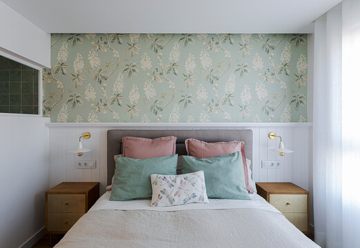 Cozy bedroom interior with elegant floral wallpaper