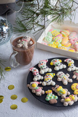 Obraz na płótnie Canvas Christmas marshmallows. Winter candy. Sweet food in december. Snowman and Santa Claus