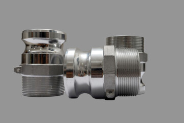 Stainless steel camlock type F coupling isolated on white, hose fitting. Tube metallic connector....