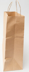 Brown Paper Shopping Bag on White. Recycled carton package for supermarket.