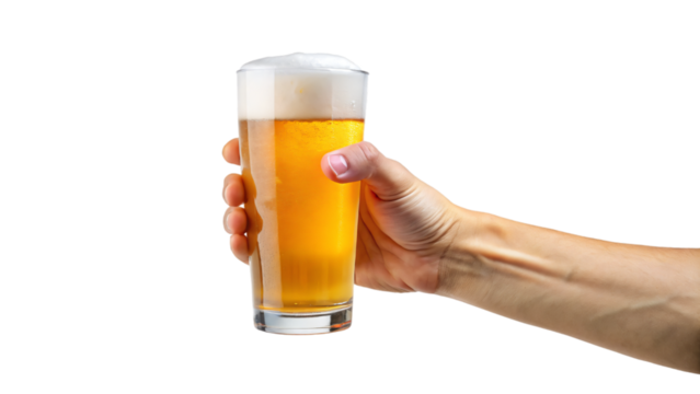 Hand holding a glass of cold beer with frothy foam