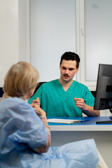 Fototapeta premium consultation between a doctor and an elderly patient in a plastic surgery clinic