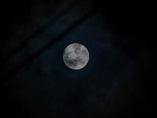 Obraz na płótnie Canvas Full moon and light clouds