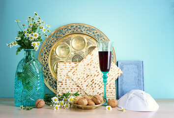 Pesah celebration concept (jewish Passover holiday). Translation of Traditional pesakh plate text: Passover, shankbone, bitter hearb, sweet date - 781307143