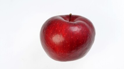 Fresh organic red apple isolated on a white background