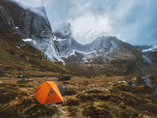 Tent camping in mountains moody nature landscape in Norway Travel in Lofoten islands adventure...