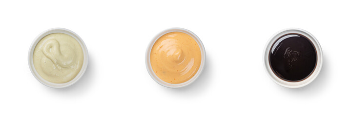 Overhead view of side dish of Asian Poke Bowl sauces including spicy mayo, eel sauce and wasabi mayo. With clipping PATH