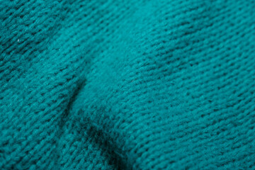 Close Up of Teal Colored Sweater - 781326397
