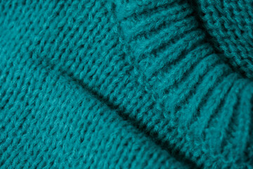 Close Up View of a Blue Sweater - 781329740