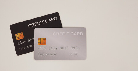 Two credit cards on white background..