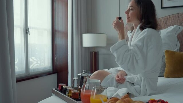 Woman Having Breakfast in Bed
