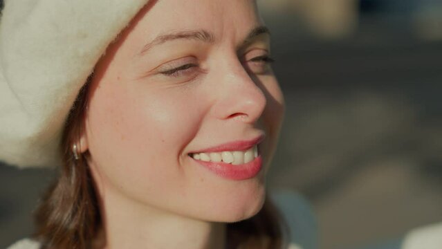 Close-up of Smiling Woman in Beret