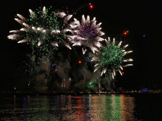 Fireworks over the sea in Cannes. Evening colorful fire show festival