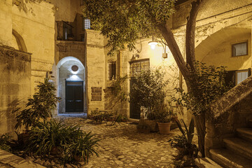 Matera street by night, Italy - 781337349
