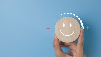 Emotion happiness feed good concept. Positive thinking and growth mindset, mental health care recovery, Happy mental. Happy smile relax face in wooden table and positive thinking .