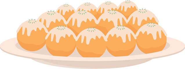 Plate with traditional indian sweet laddu.